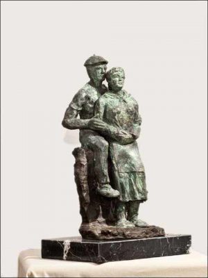 Esculturas de bronce. Pareja de aldeanos.